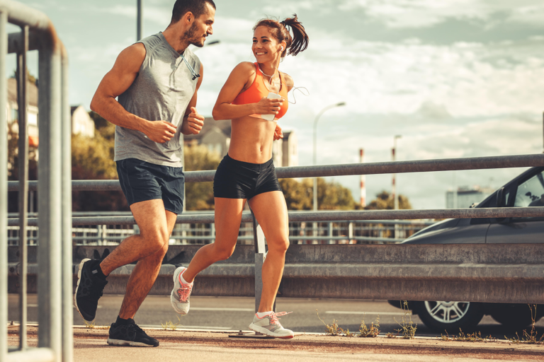 man and woman enjoying outdoor run for cardio