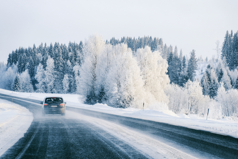 car driving on snowy road