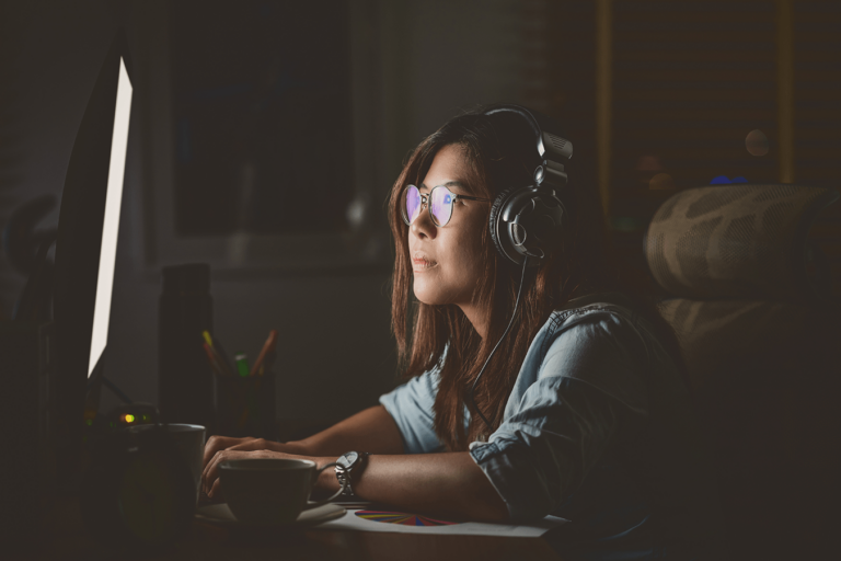 woman looking at computer